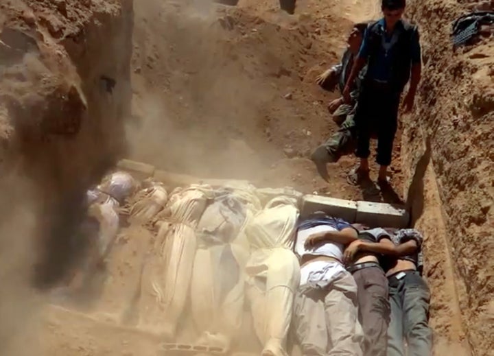 The activists say the mass graves may be the result of atrocities carried out by ISIS as well as by government forces. A vide
