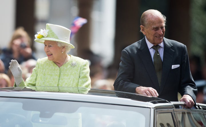 The monarch then drove through Windsor in an open-topped car with her husband Prince Philip.