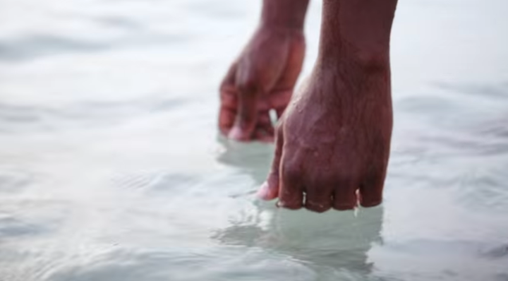 The hands of Suleiman Abdullah Salim, one of the three men who was tortured under the CIA's enhanced interrogation program, are shown in this still from a video produced by the ACLU. Salim is now back to working as a fisherman.