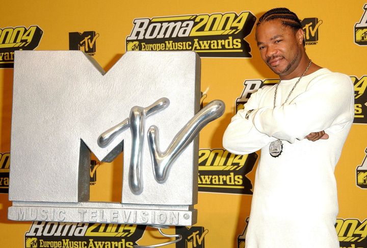 Rap artist Xzibit poses with the MTV logo in 2004.
