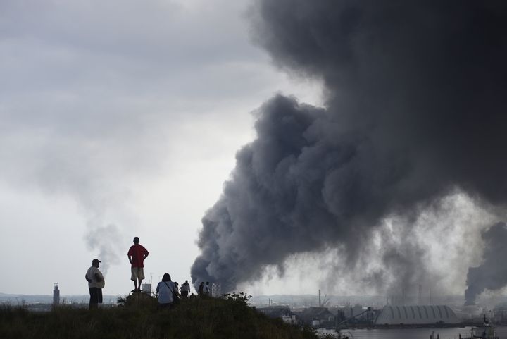 Smoke rose from the explosion site at Pemex's Pajaritos petrochemical complex in Coatzacoalcos, Veracruz state, Mexico. Twenty-four people were killed in the blast.