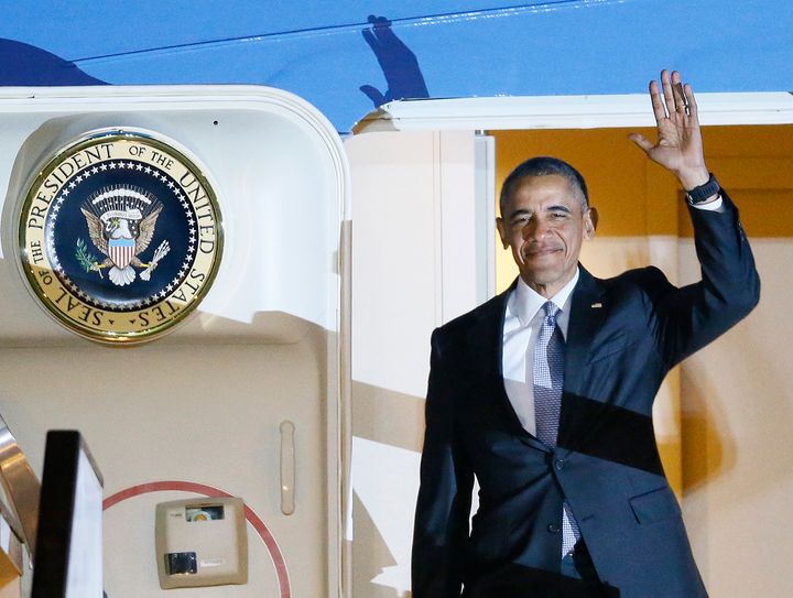 <strong>President Obama steps out of Air Force One on his arrival at Stanstead Airport Thursday night</strong>