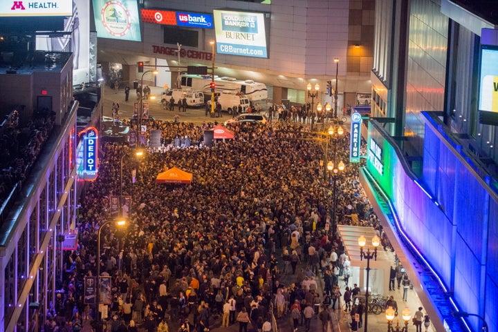 <strong>Fans gathered in the street outside the night spot, where he filmed the 'Purple Rain' video</strong>