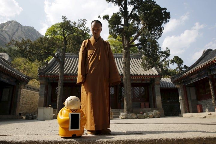 Master Xianfan, Xian’er’s creator, said the robot monk was the perfect vessel for spreading the wisdom of Buddhis