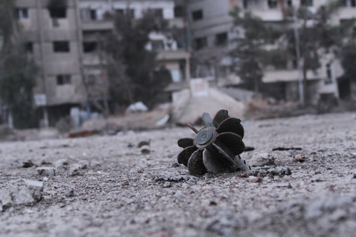 The remains of a mortar are seen in Daraya. Haboub's family had been active in protests and in distributing anti-re