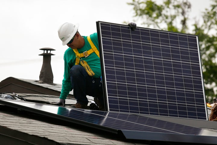 A solar panel is installed on the roof of a home in Los Angeles in 2014. More solar energy will be coming to San Francisco, which will require new buildings 10 stories and under to install solar panels starting in 2017. 