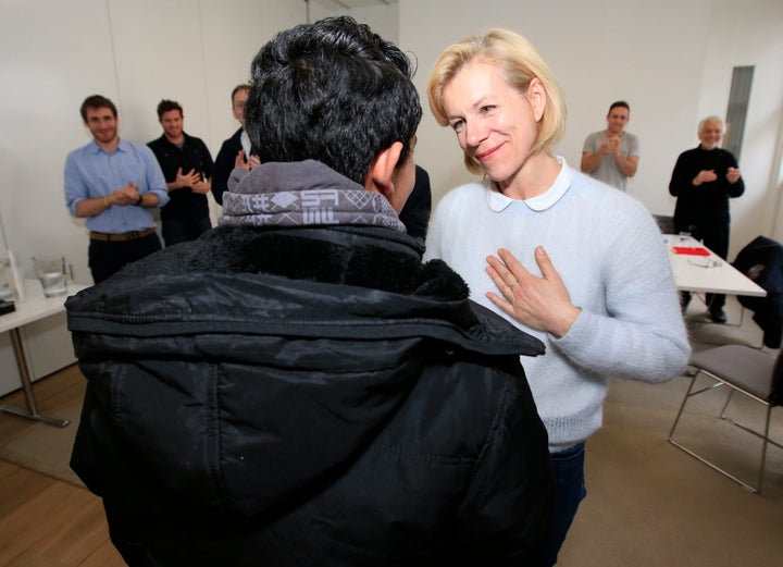 <strong>Actress Juliet Stevenson (pictured with a Syrian refugee in London) bought Clegg the double decker bus that now serves as the centre</strong>