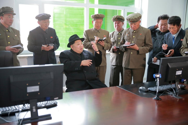 North Korean leader Kim Jong Un visits the Paektusan Hero Youth Power Station No. 3 in this undated photo released by North K