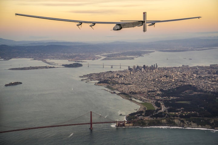 Solar Impulse 2 flies over the Golden Gate Bridge in San Francisco before completing its flight across the Pacific Ocean.