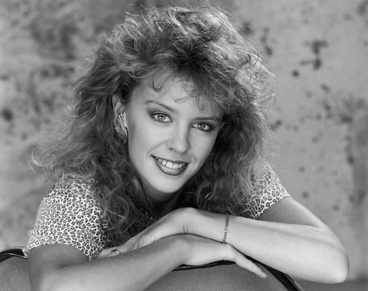 <strong>Kylie in her permtastic 'Neighbours' days.</strong>
