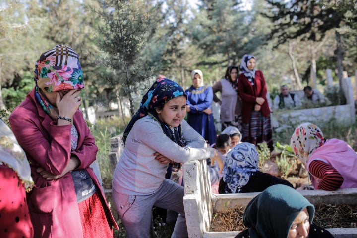 A young girl cries during a funeral in Kilis on April 25, a day after rockets hit the Turkish border city. 