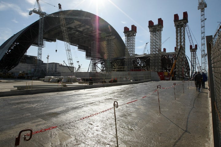 A steel-clad arch, costing 1.5 billion euros, has just been completed. It was designed to enclose the stricken