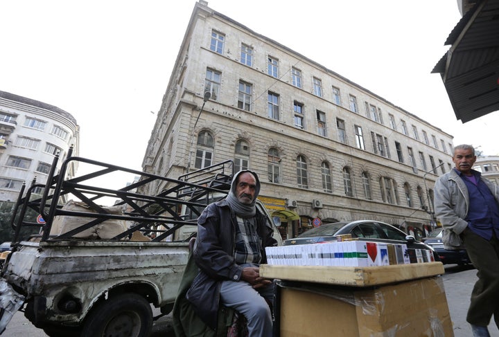 New government-imposed security regulations in Damascus are forcing the city's new arrivals to turn to bribery. A m