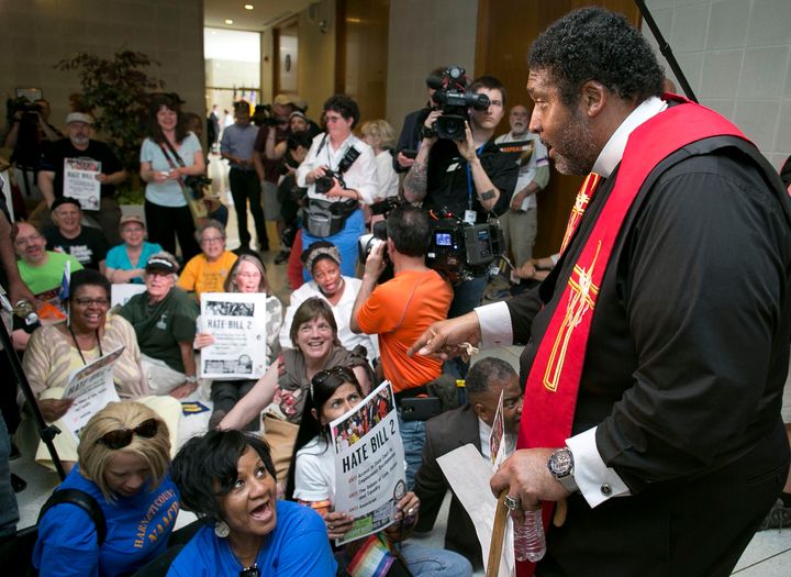 North Carolina NAACP President Rev. William Barber leads a peaceful sit-in protest in opposition to HB2 at the State Legislative Building in Raleigh, N.C., on Monday, April 25, 2016.