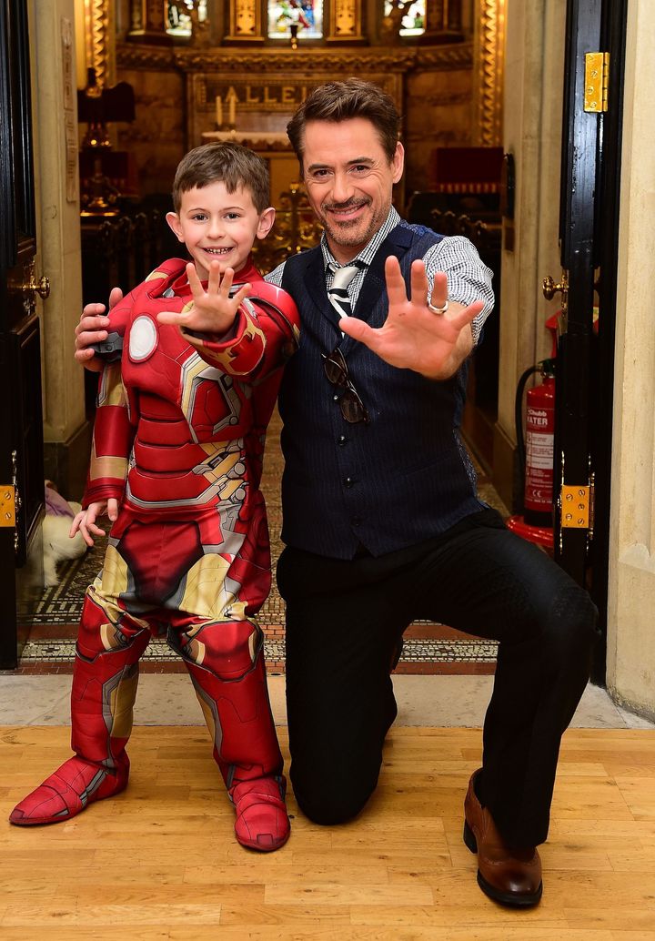 "Iron Man" actor Robert Downey Jr. meets 7-year-old Ethan Miller, from Southend, Essex, who suffers from the rare blood disease ITP as well as type 1 diabetes, during a visit to Great Ormond Street Hospital (GOSH), in London.