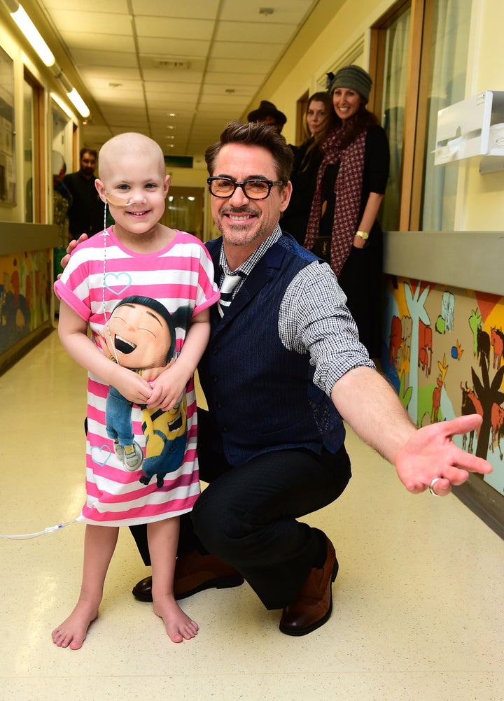 Robert Downey Jr. with Chloe Bowers, aged 5 from Ruislip, West London.