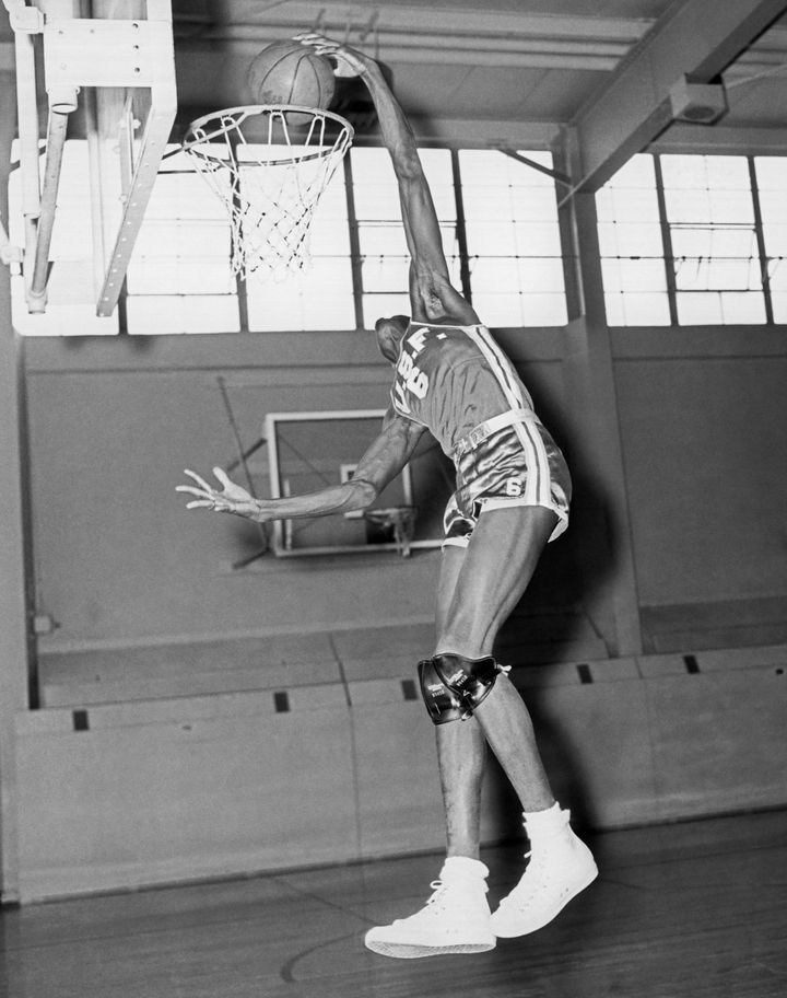 Russell, while a player at University of San Francisco, shows his form in April 1956.