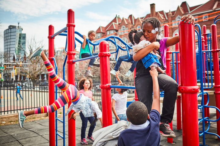 Kenya and friends play on the jungle gym during recess. When a young person loses a family member to a shooting, it “messes up the person’s feelings and brain,” says Naomi, 10, “and they, like, don’t trust people.”