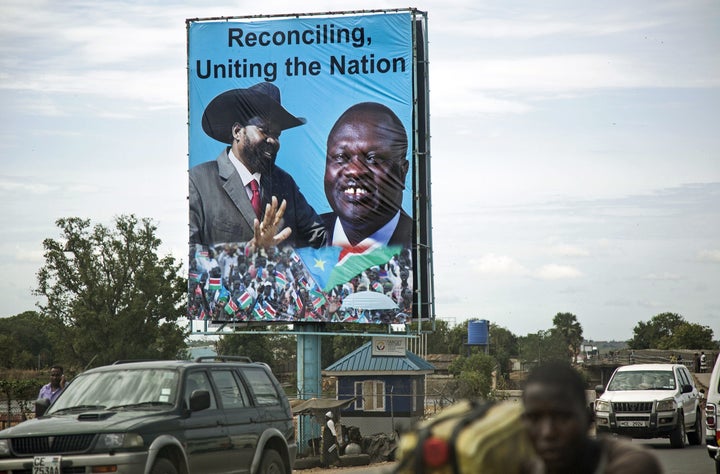 Above, a billboard of President Salva Kiir and opposition leader Riek Machar in Juba earlier this month. Machar's r