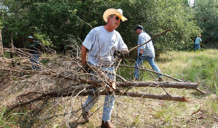 President George W. Bush often made sure to be spotted doing hard work around his ranch, projecting the rugged image he worked hard to cultivate.