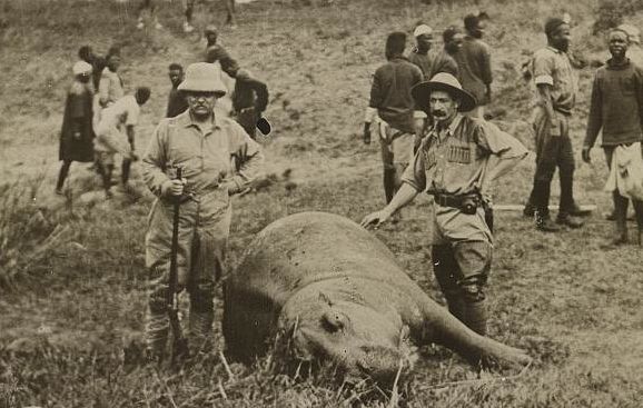 What's more manly than renowned outdoorsman Theodore Roosevelt standing with a rifle next to a dead hippopotamus? 