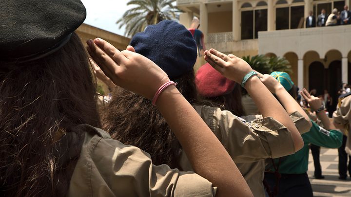 Armenian Youth Scouts salute Aram I Keshishian, the head of the Holy See of Cilicia of the Armenian Apostolic (Orthodox) Church during the Armenian Genocide commemoration ceremony in Antelias, Lebanon.