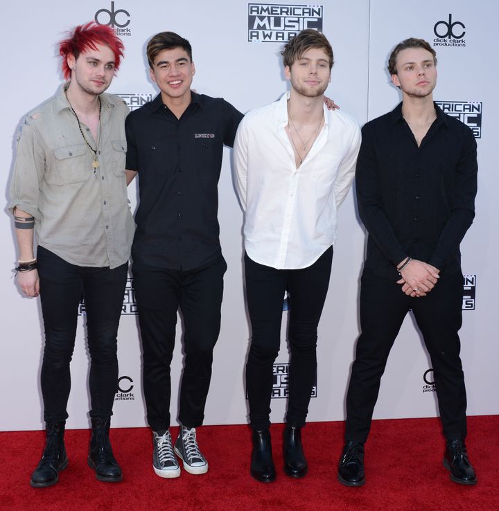 5 Seconds of Summer modelling skinny jeans at a premiere (file photo)