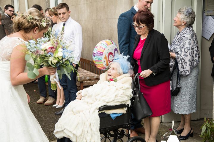 It's hard to tell who had more fun on the wedding day: the beautiful bride or this eager bridesmaid.