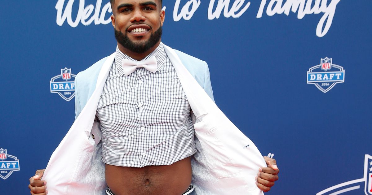 Ezekiel Elliott is wearing a crop top under his NFL Draft suit