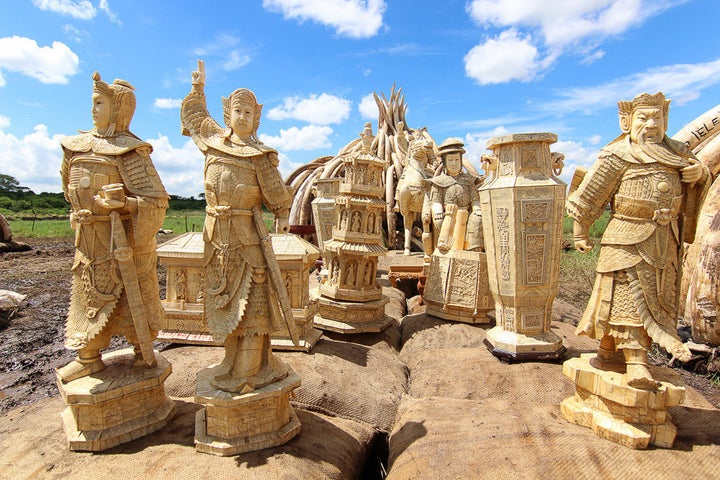 Ivory statues atop a pyre, which will be set alight alongside 105 tons of confiscated elephant tusk.