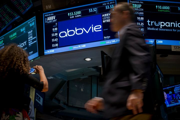 A screen displays the share price for pharmaceutical maker AbbVie on the floor of the New York Stock Exchange July 18, 2014.