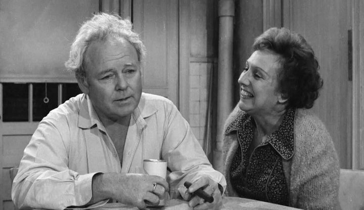 Carroll O'Connor had the role of Archie Bunker on "All in the Family," alongside Jean Stapleton, who portrayed his wife, Edith, both shown here on set in 1976.