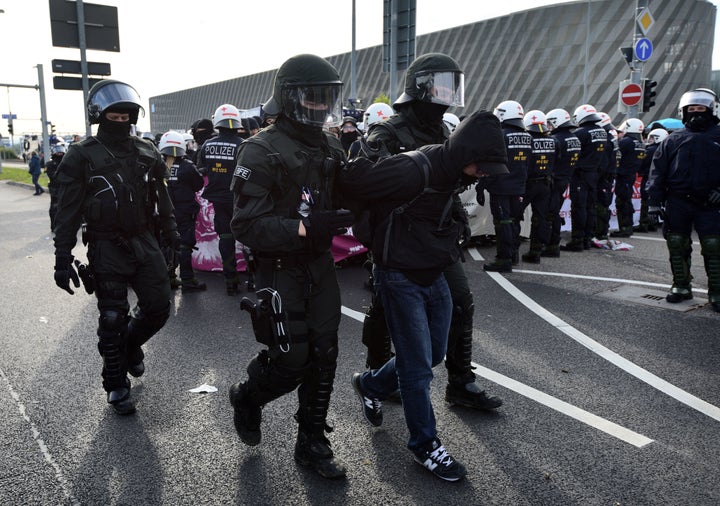 Police said 400 protesters were detained for throwing stones and fireworks.