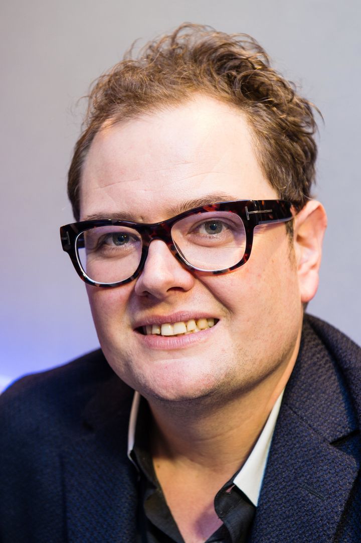 Alan Carr reveals some of the worst slurs on his personality have come from within the gay community