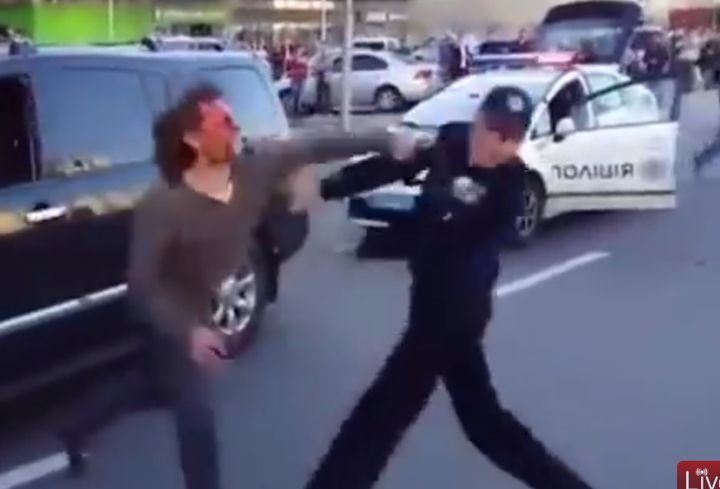 Yacheslav Oliynyk tries to punch an officer after being pulled over