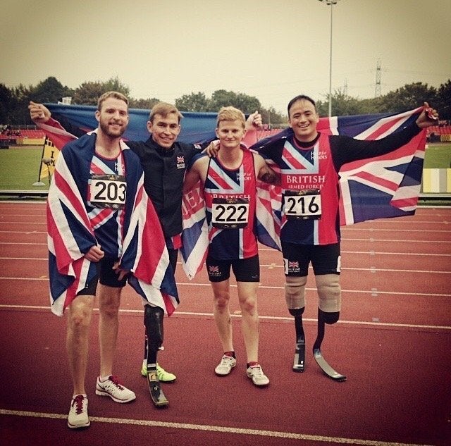 Marine Sam Stocks, second right, will celebrates his race at the first ever Invictus Games in London, in 2014