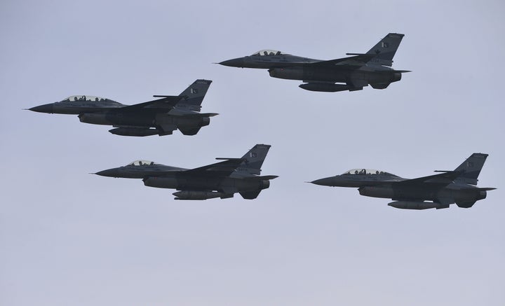 Pakistani F-16 fighter jets fly past during the Pakistan Day military parade in Islamabad on March 23, 2016.