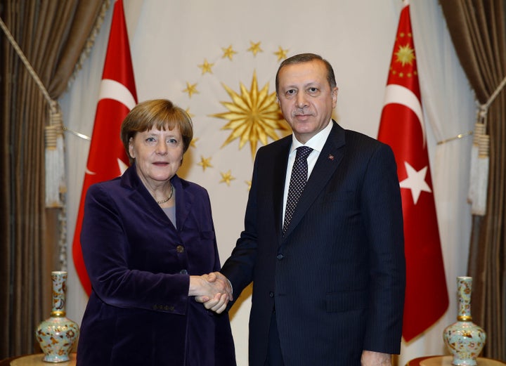 Merkel was accused of getting cozy with Turkish President Tayyip Erdogan over a controversial deal that would help stem refug