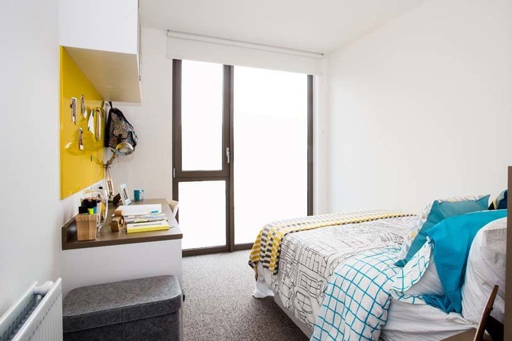 A student room is shown flooded with light in marketing materials for a building directly adjacent to the proposed Apex House