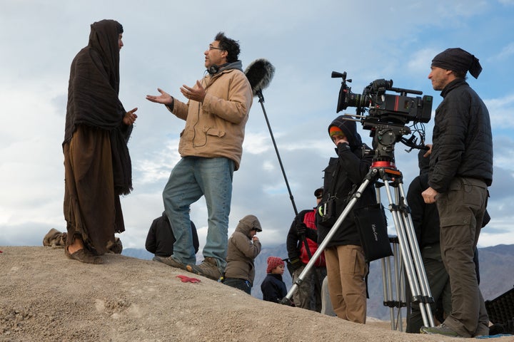 Ewan McGregor, as Yeshua, chats with director Rodrigo Garcia on set for "Last Days in the Desert," shot by acclaimed cinemato