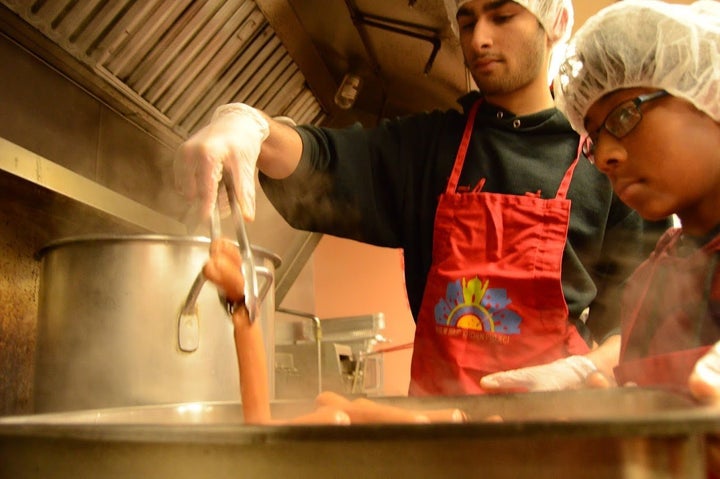 Volunteers prepare a meal in Schenectady, NY.