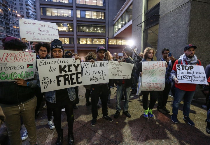 Students hold placards as they stage a demonstration at the Hunter College, which is a part of New York City University, to protest ballooning student loan debt for higher education and rally for tuition-free public colleges in New York on Nov. 13, 2015. At least <a href="https://studentaid.ed.gov/sa/about/data-center/student/default" role="link" class=" js-entry-link cet-external-link" data-vars-item-name="1.2 million Americans" data-vars-item-type="text" data-vars-unit-name="5728fdebe4b0bc9cb044dc16" data-vars-unit-type="buzz_body" data-vars-target-content-id="https://studentaid.ed.gov/sa/about/data-center/student/default" data-vars-target-content-type="url" data-vars-type="web_external_link" data-vars-subunit-name="article_body" data-vars-subunit-type="component" data-vars-position-in-subunit="21">1.2 million Americans</a> defaulted last year on federal student loans.