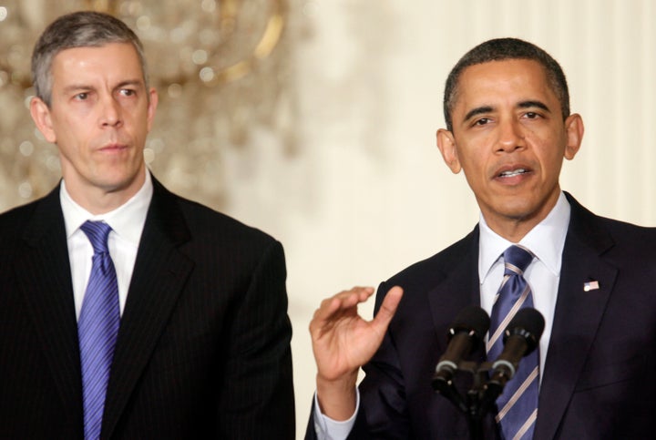 President Barack Obama and Secretary of Education Arne Duncan in 2012. One of Duncan's last acts before leaving office in 2015 was reappointing James Runcie, despite various student loan issues during his tenure.