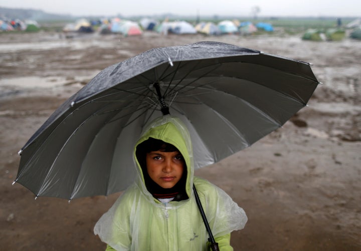 A child refugee in a border station in Greece