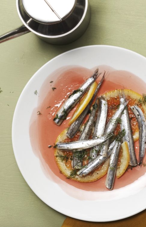 Anchovies marinated with fennel fronds.