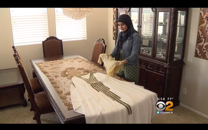 Shalabi lays out her prom outfit.