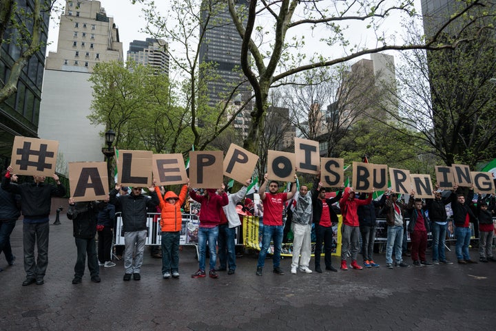 Syrian-Americans protest the violence in Aleppo in New York. Dozens have been killed during intense battles in the city. 