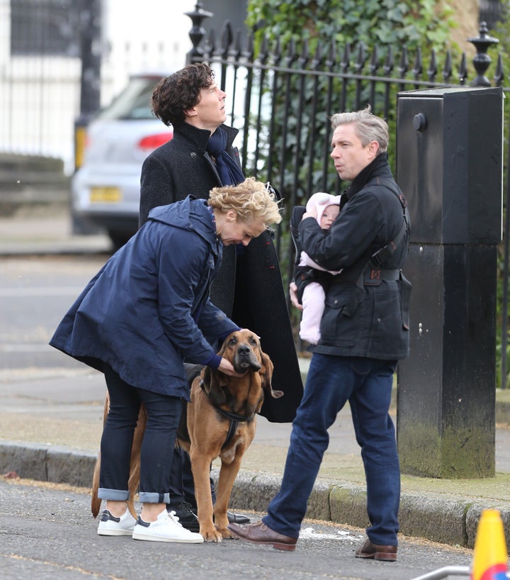 <strong>There he is! Looks like Watson is left holding the baby while his new sidekick assists Sherlock</strong>
