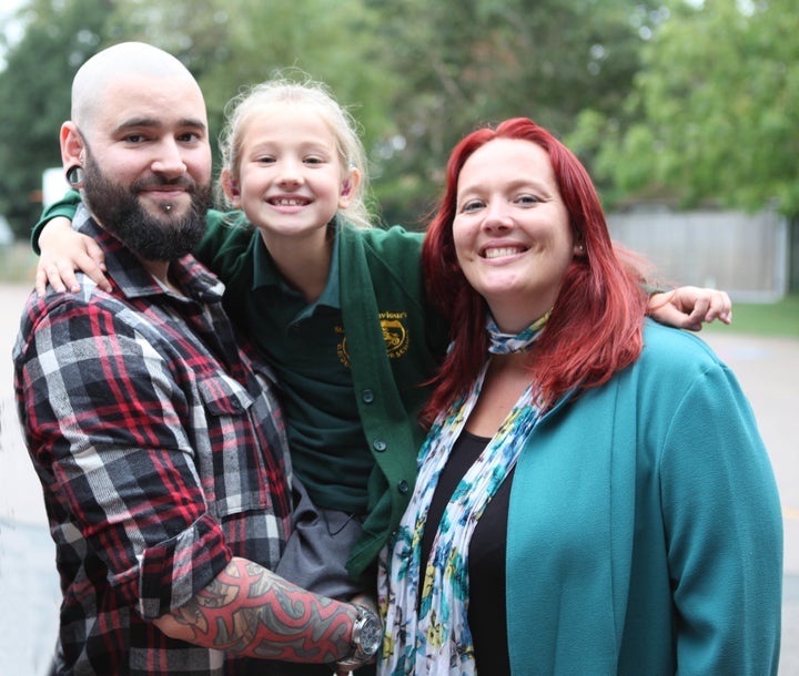 Olivia Wickham with her mum and dad