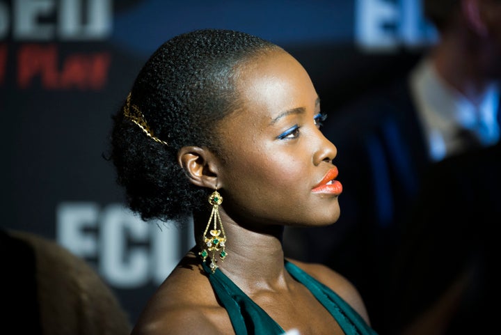 Nyong'o with her hair pulled back for the 'Eclipsed' Broadway opening. 